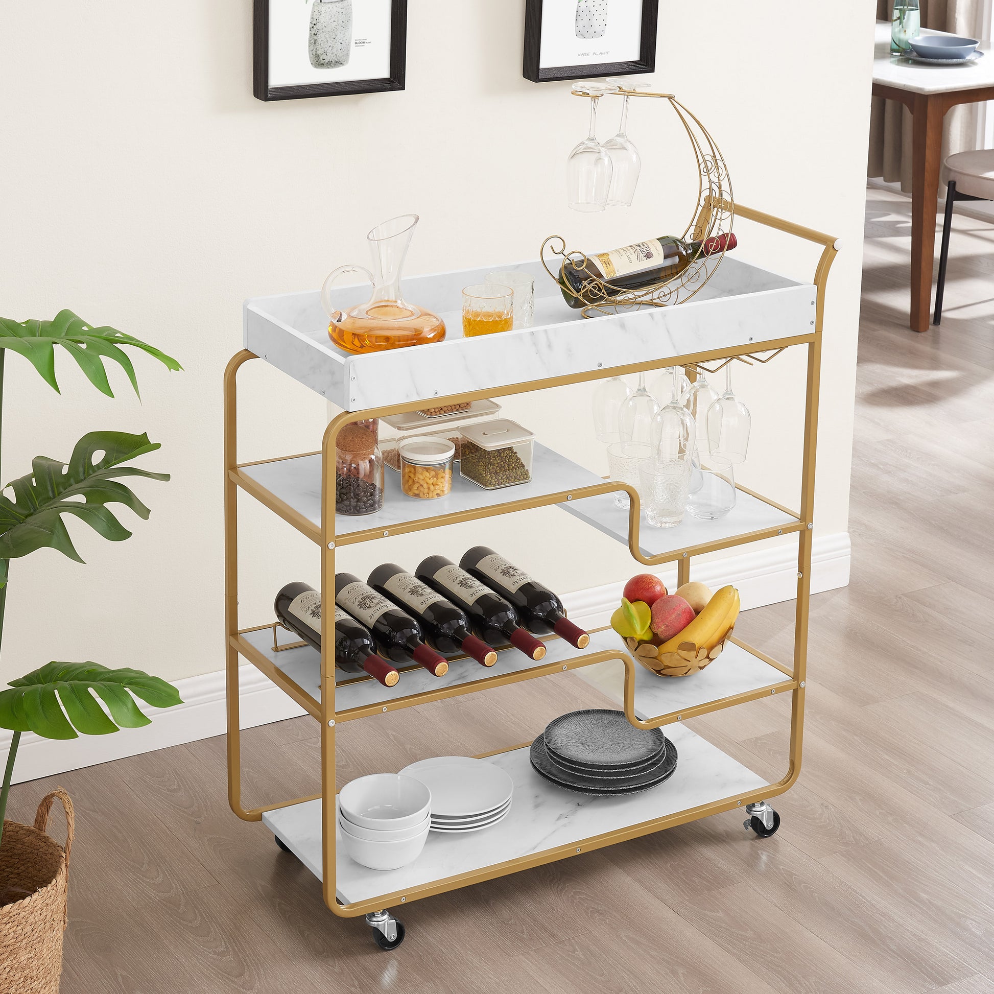 Gold and marble bar cart with wine bottles and glasses