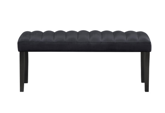 Dark gray velvet bench with channel tufting and dark wood legs