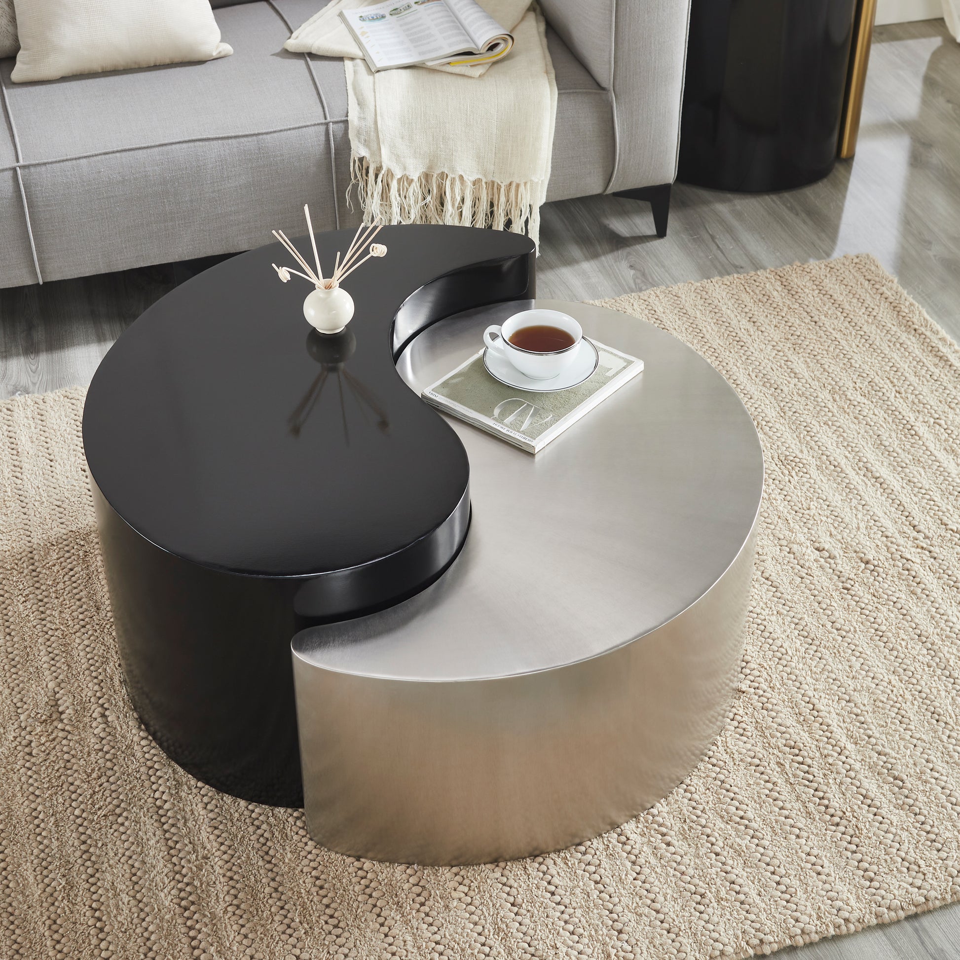 Yin Yang coffee table with black and silver finishes ideal for modern living rooms