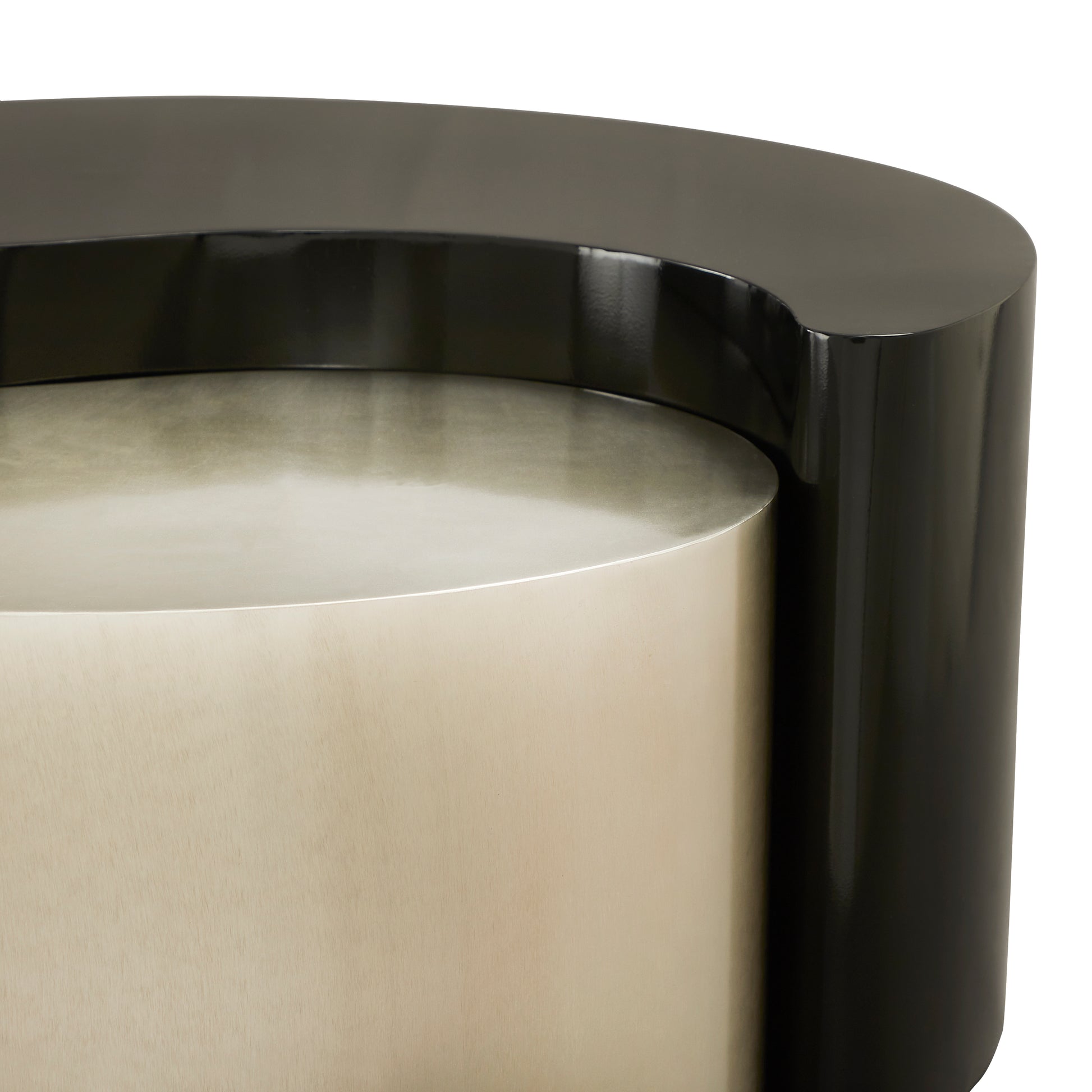 Sleek black and brushed brass Cshaped end table with modern design