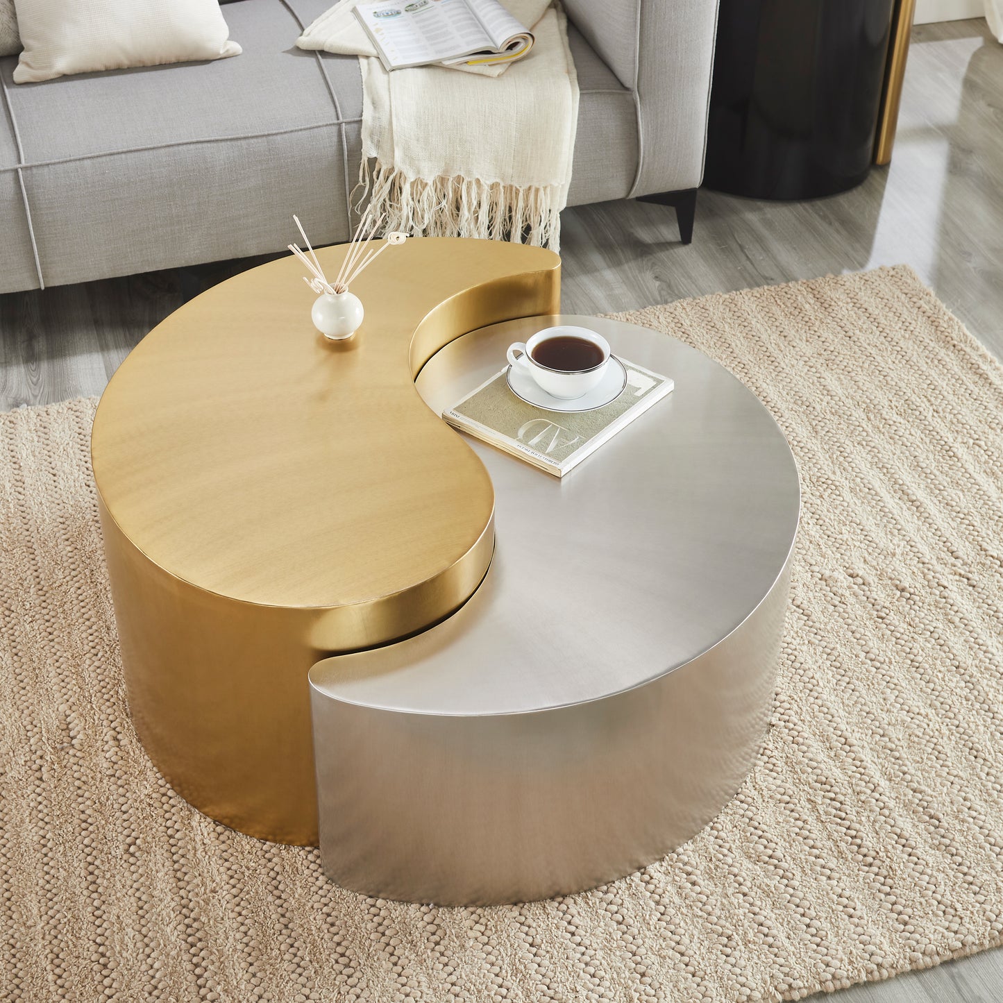 Interlocking coffee table with brass and silver finishes modern design