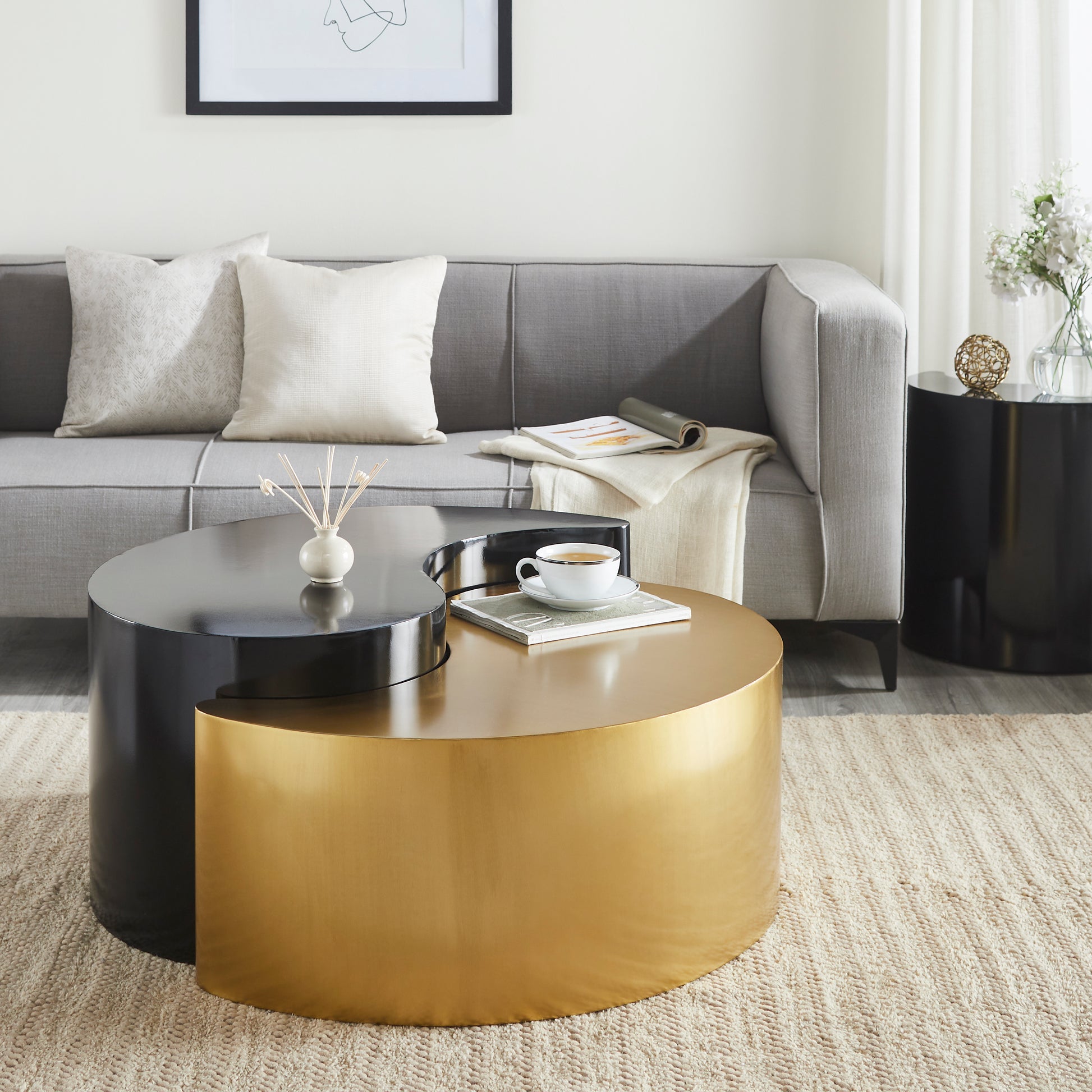 Modern yinyang coffee table in black and gold metal a stylish centerpiece for living rooms