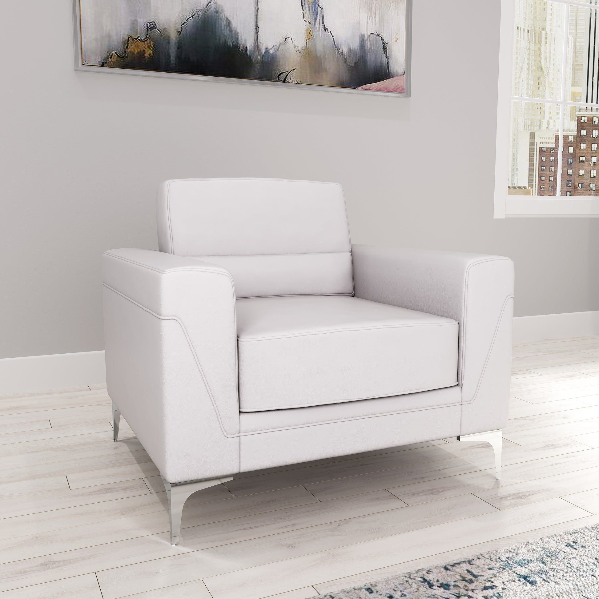 Modern white leather armchair with sleek chrome legs perfect for living room seating