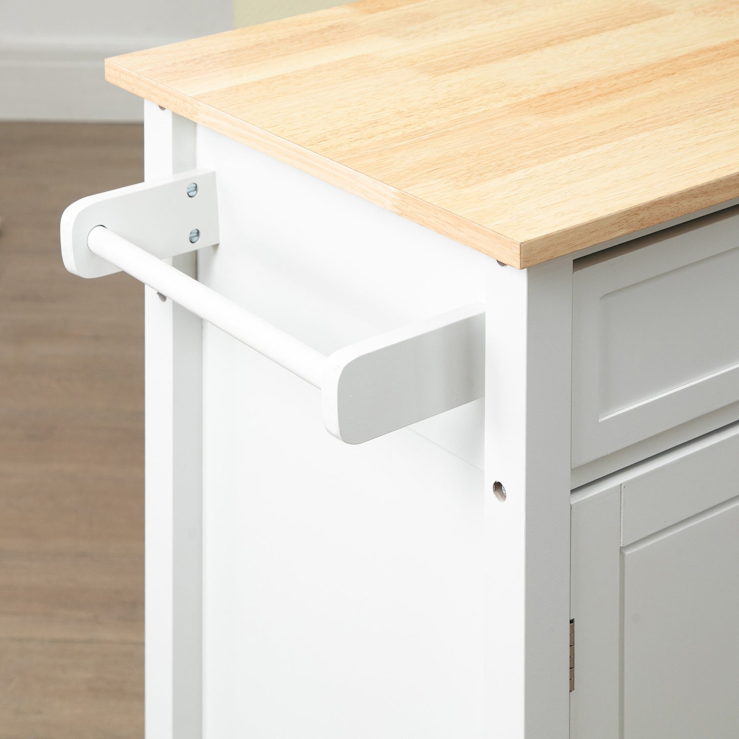 White kitchen cart with butcher block top and towel bar
