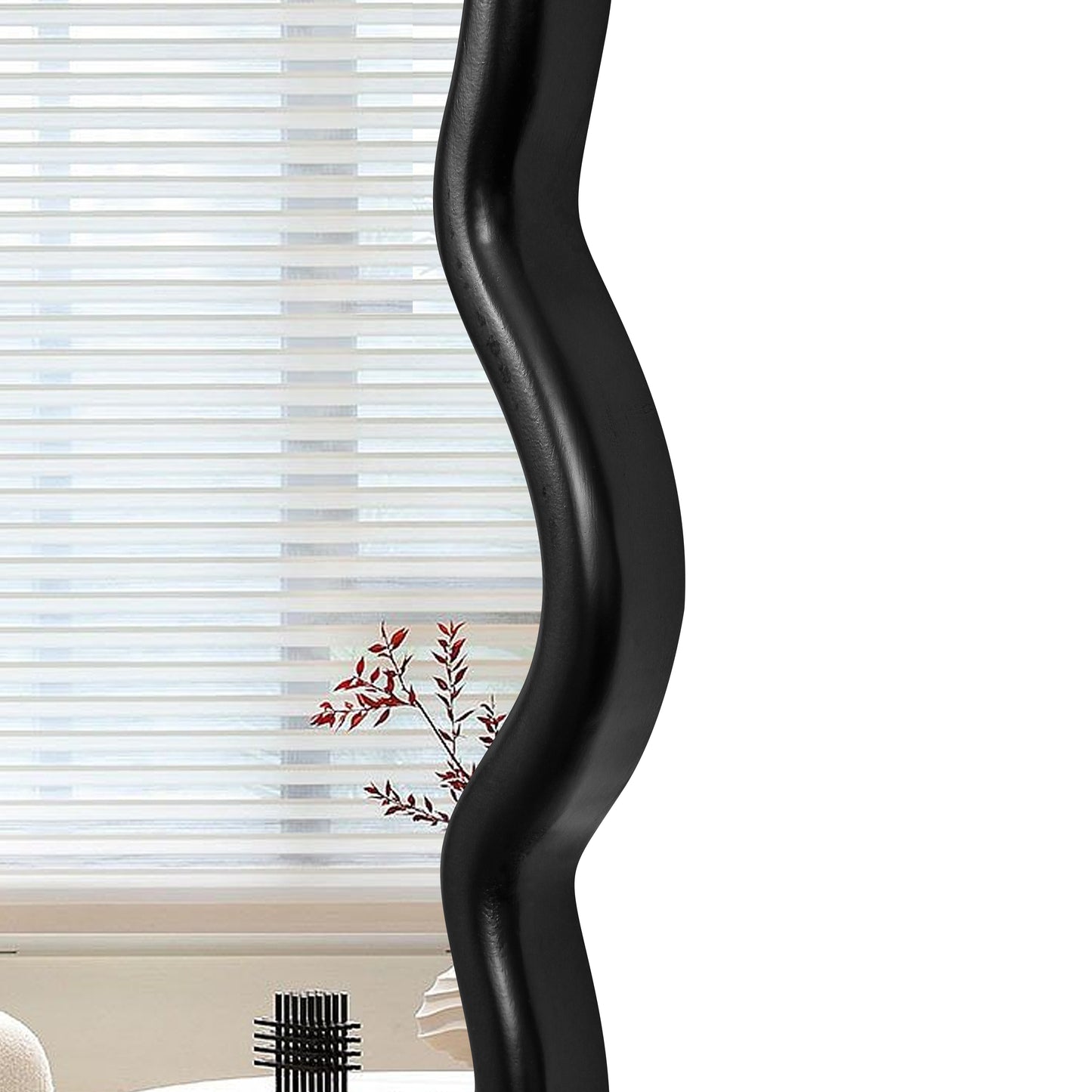 Black sculptural metal floor lamp with curved base and modern design