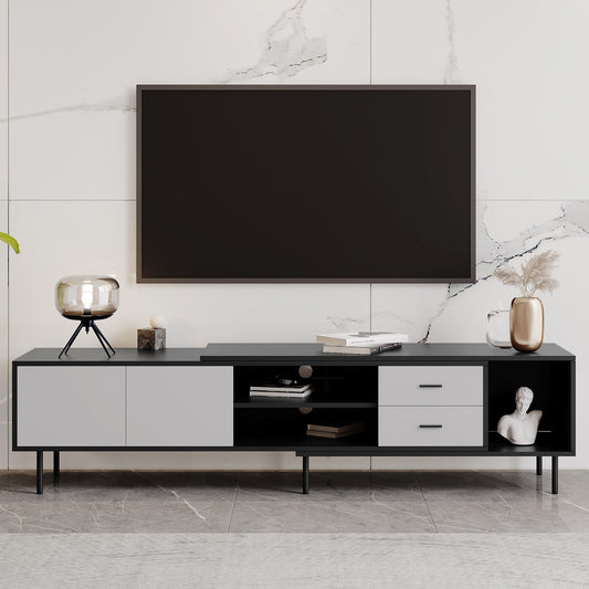 Modern black and grey TV stand with ample storage featuring two drawers and open shelves