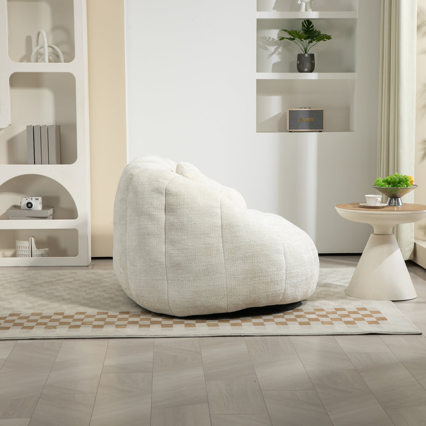Plush ivory boucl bean bag chair with channel tufting perfect for a modern living room
