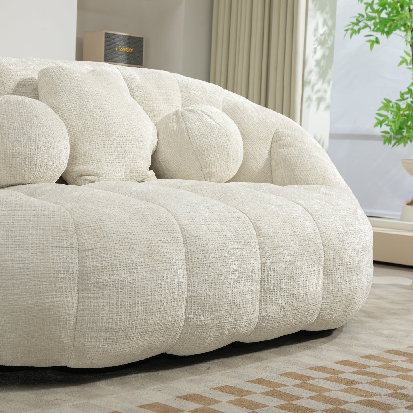 Textured cream boucle sofa with plush rounded cushions modern living room accent