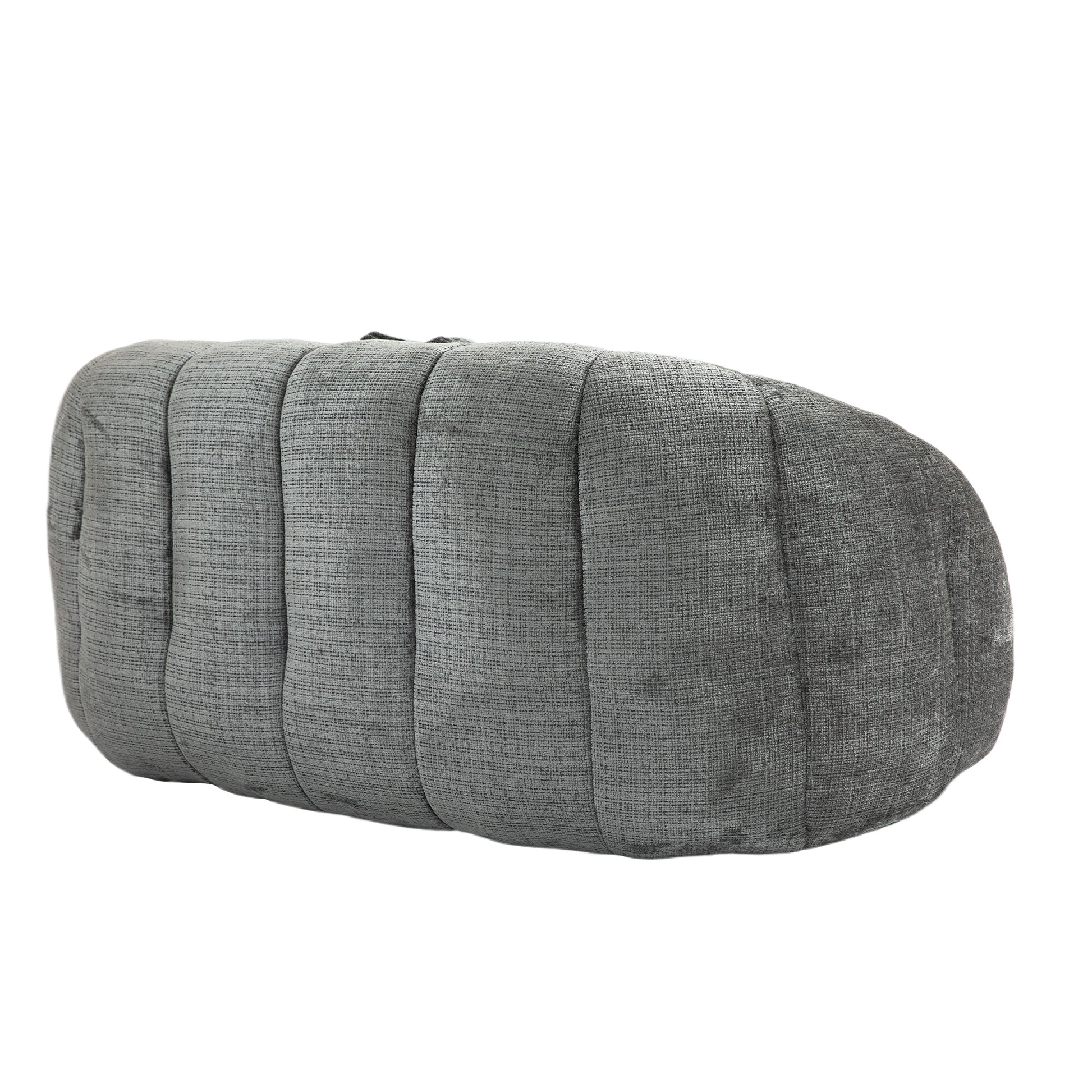 Textured gray fabric oval ottoman with vertical channel tufting for modern living rooms