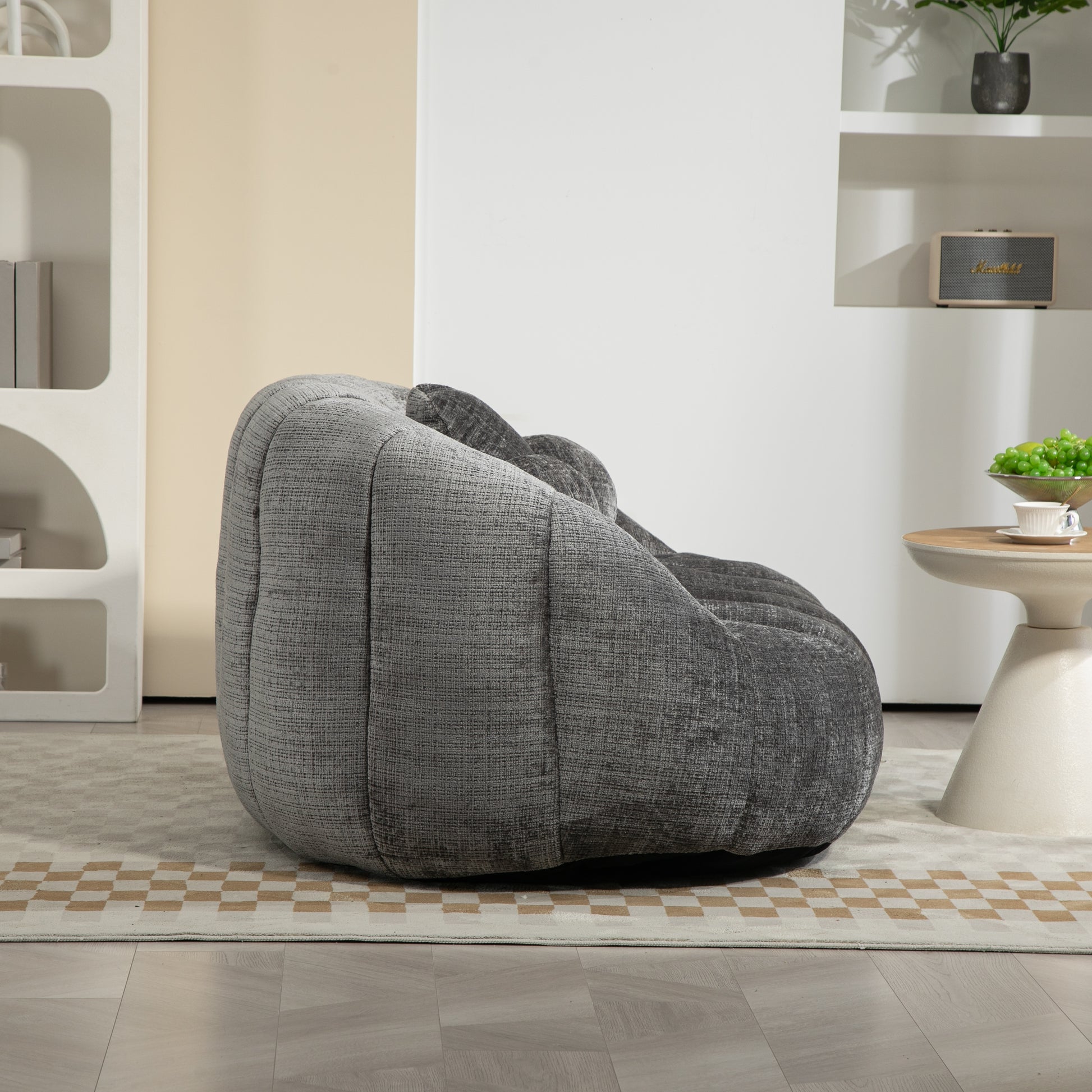 Textured grey bean bag chair for a cozy living room setup