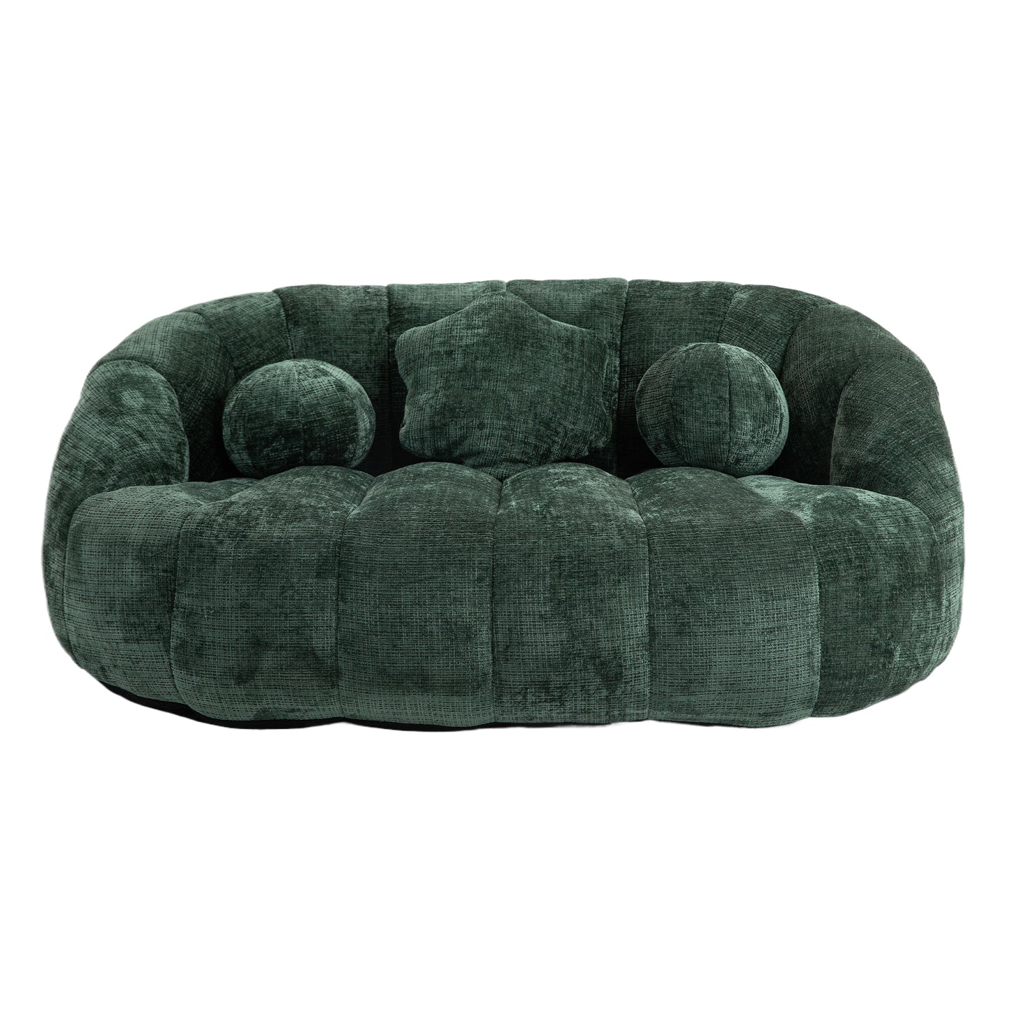 Plush green velvet sofa with rounded shape and three decorative pillows