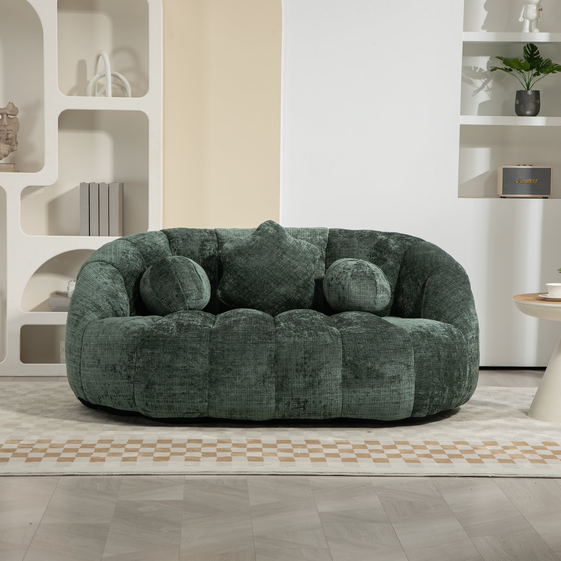 Plush green velvet sofa with contemporary tufted design perfect for living rooms