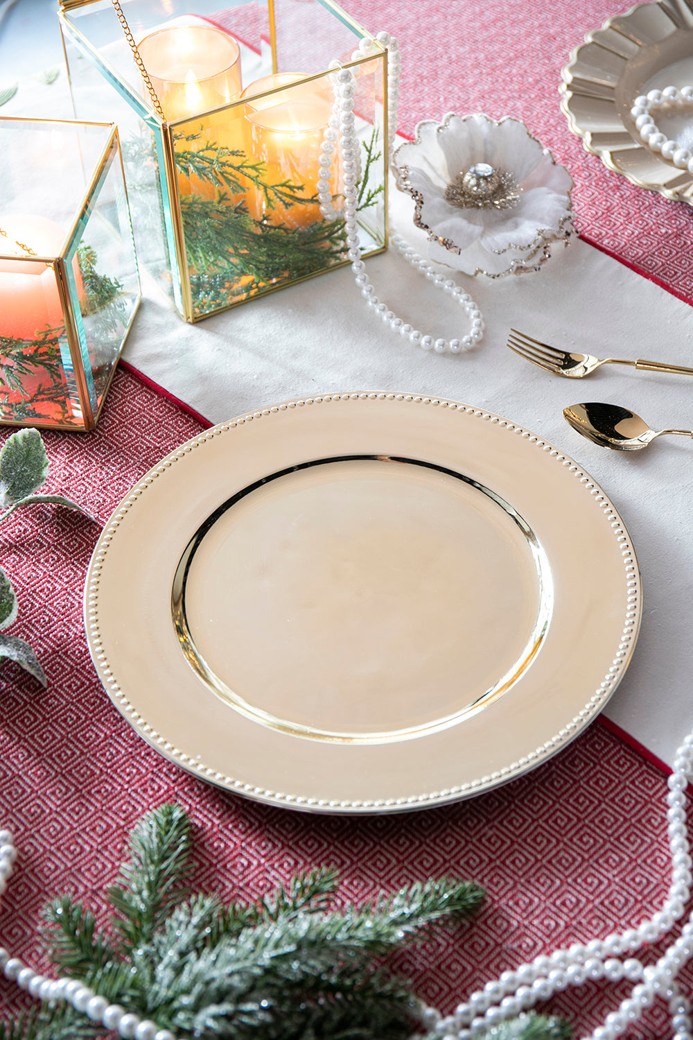 Elegant gold charger plate with beaded rim perfect for festive table settings