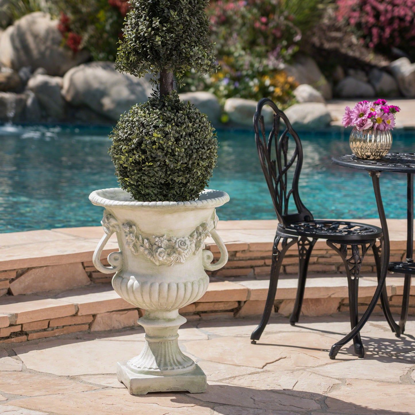 Artificial topiary tree with sphere and cone shape in ornate planter