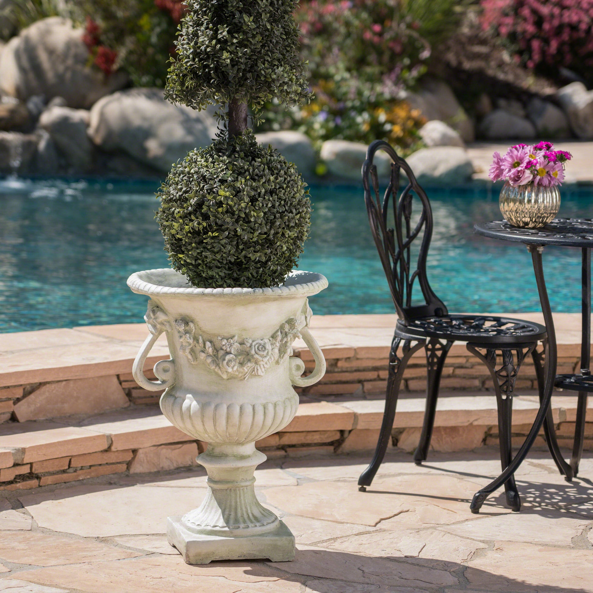 Artificial topiary tree with sphere and cone shape in ornate planter