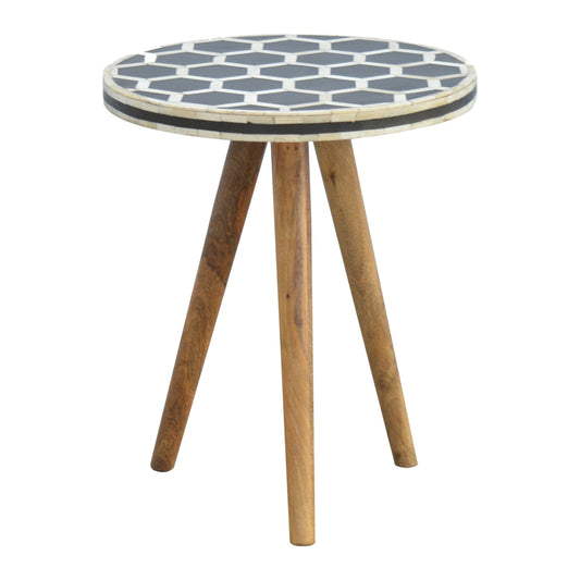 Round bone inlay side table with hexagonal pattern and wooden legs