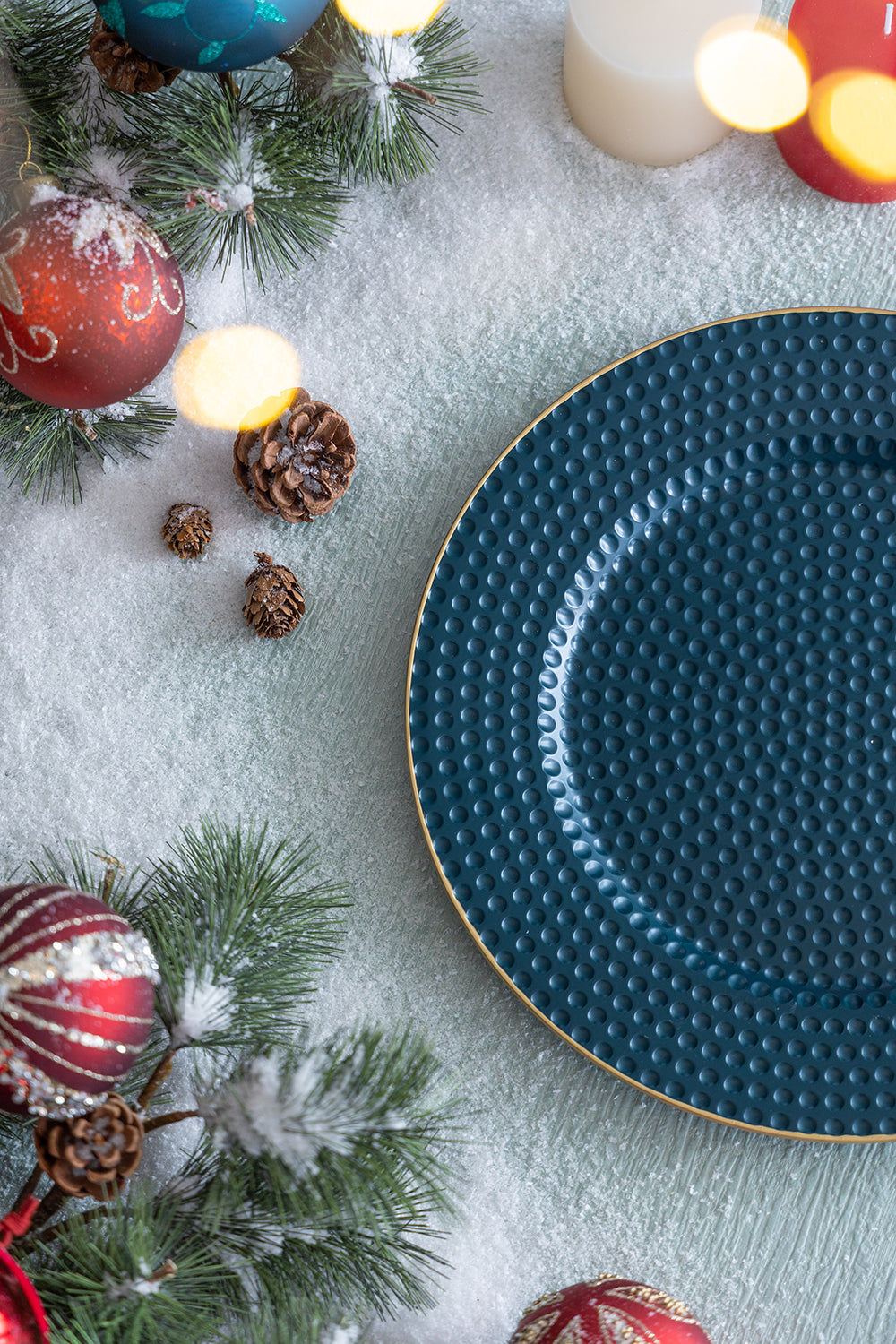 Textured teal dinner plate with gold rim ideal for festive holiday settings