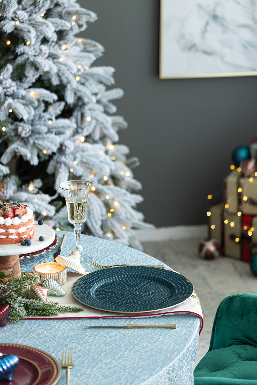 Textured dark teal dinner plate with gold rim perfect for holiday dining