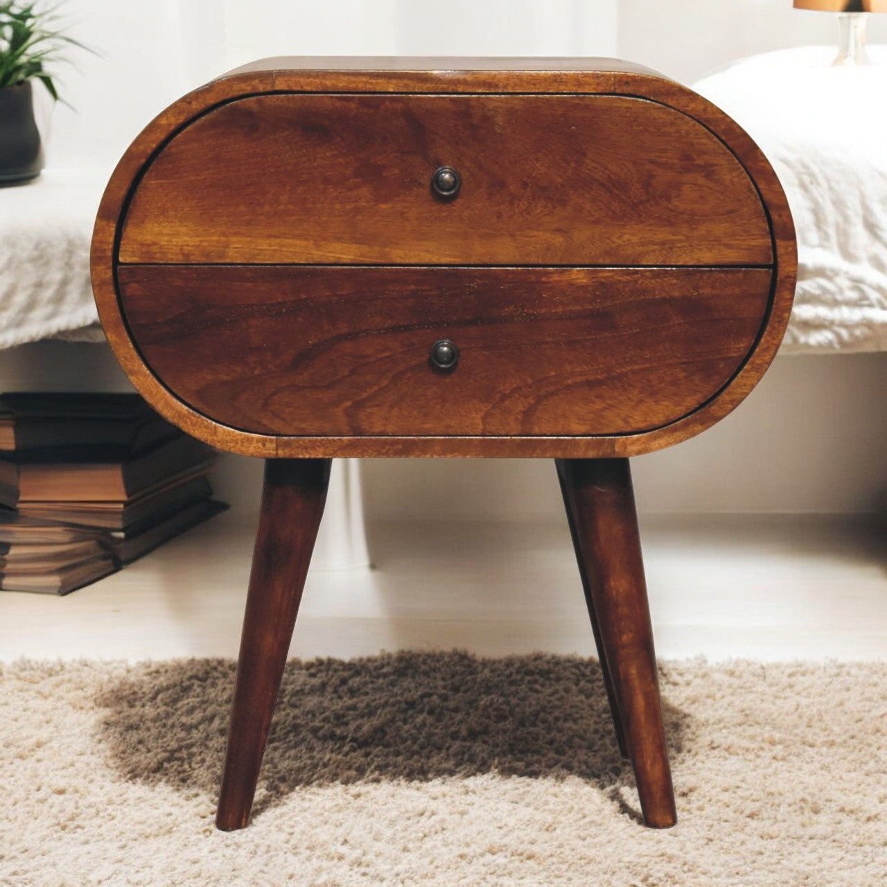 Midcentury modern nightstand with two rounded drawers in rich walnut finish
