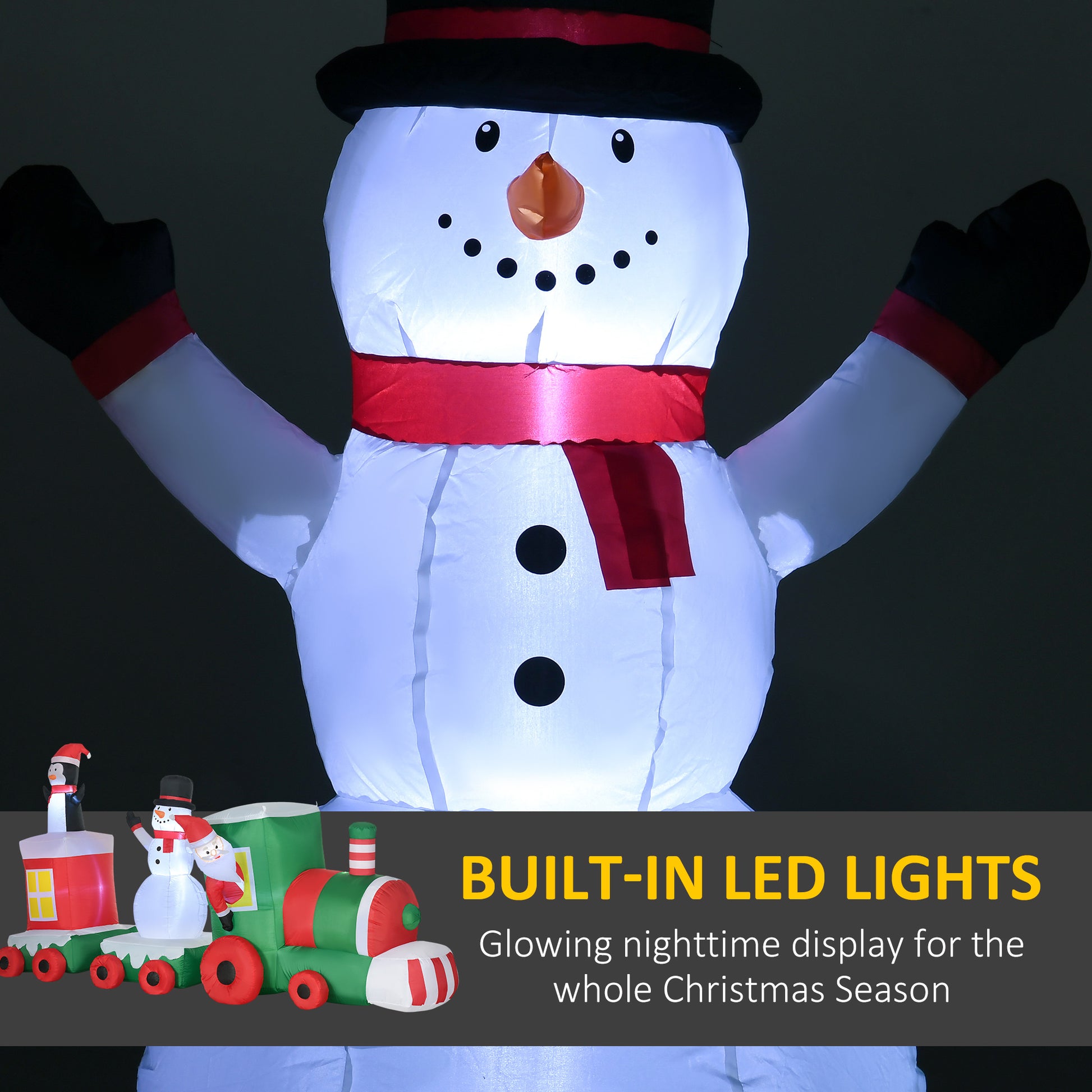 Large inflatable snowman with red scarf and black hat illuminated for Christmas