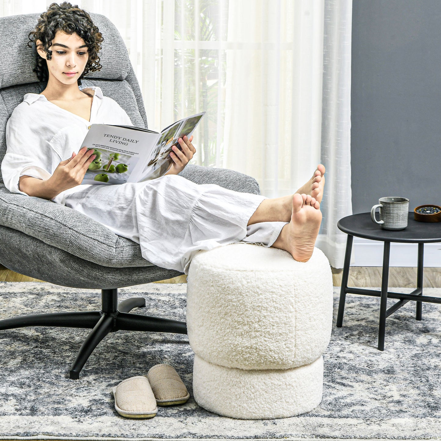 Fluffy white round ottoman a cozy footrest for relaxation