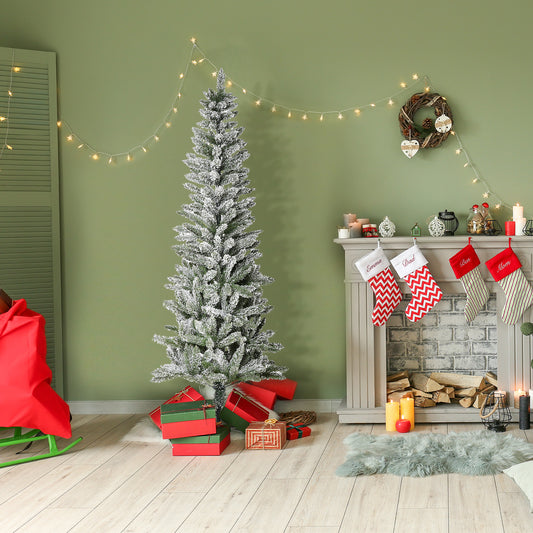 Flocked artificial Christmas tree with white tips decorated with warm star string lights