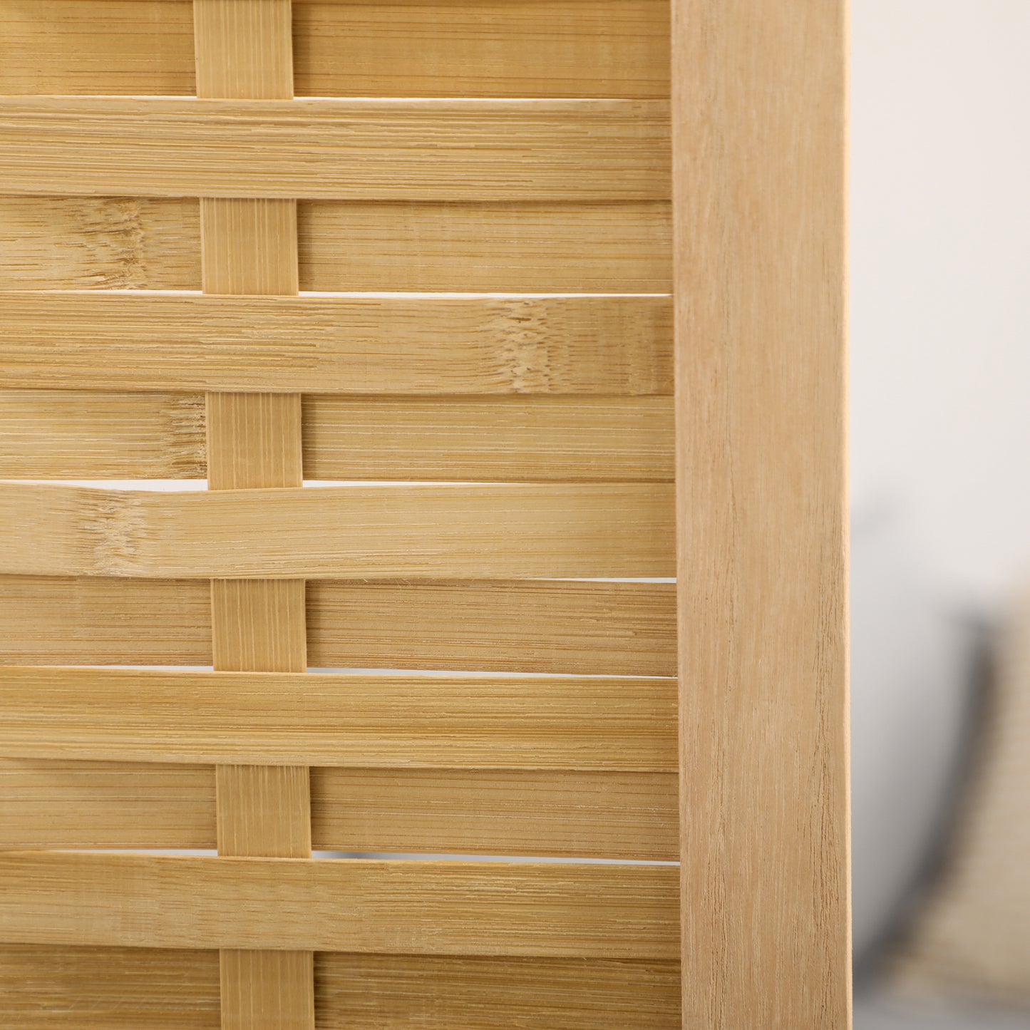 Woven natural bamboo panel with a light wood trim ideal for decorative screens