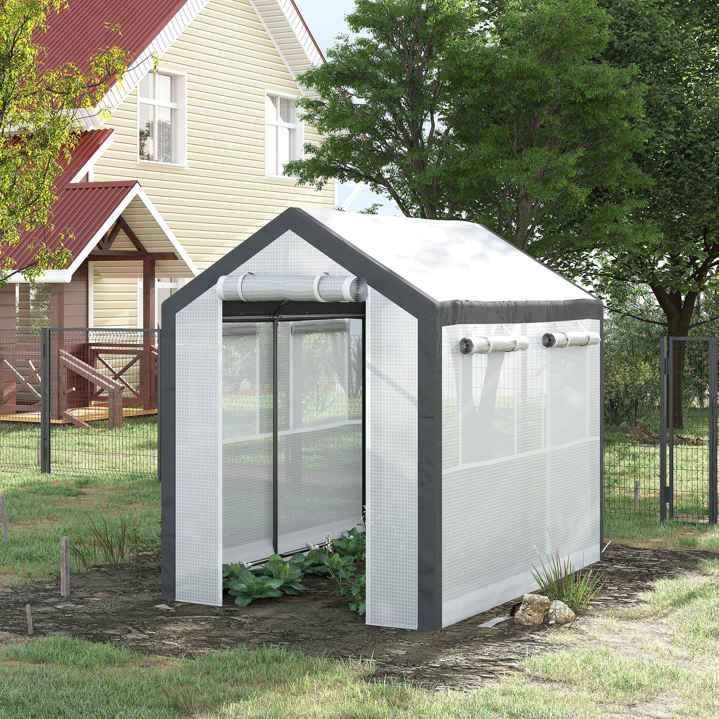 Compact greenhouse with a white textured cover and dark gray frame featuring rollup windows for ventilation
