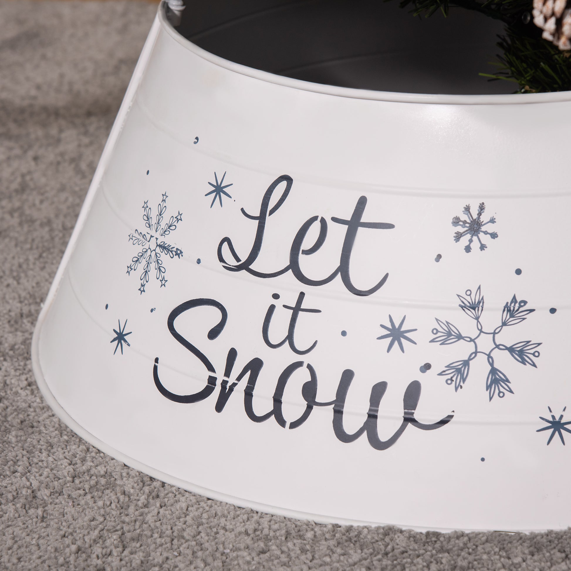 White metal tree collar with Let it Snow script and snowflake accents