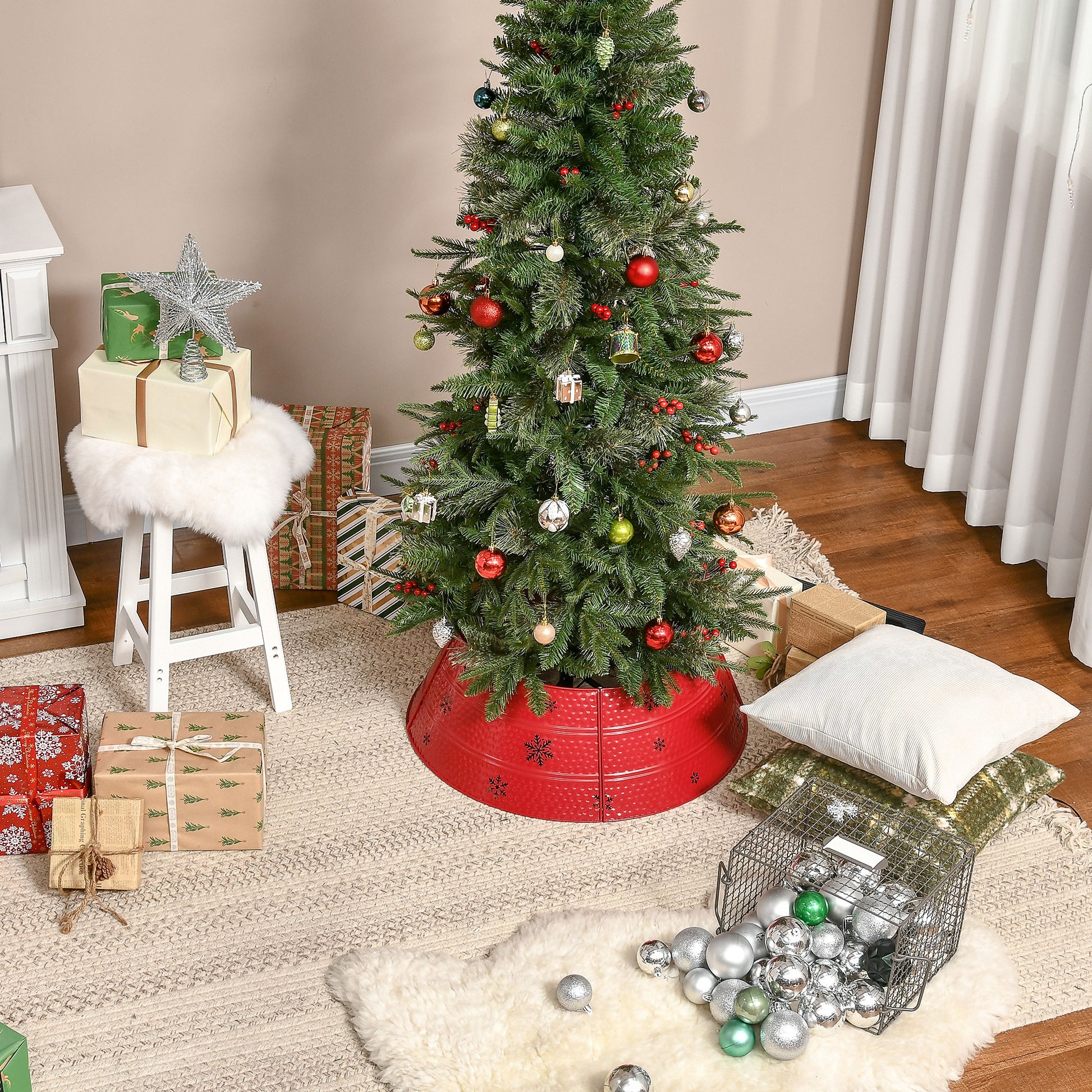 Glittering silver star tree topper adorns a Christmas tree with red and gold ornaments