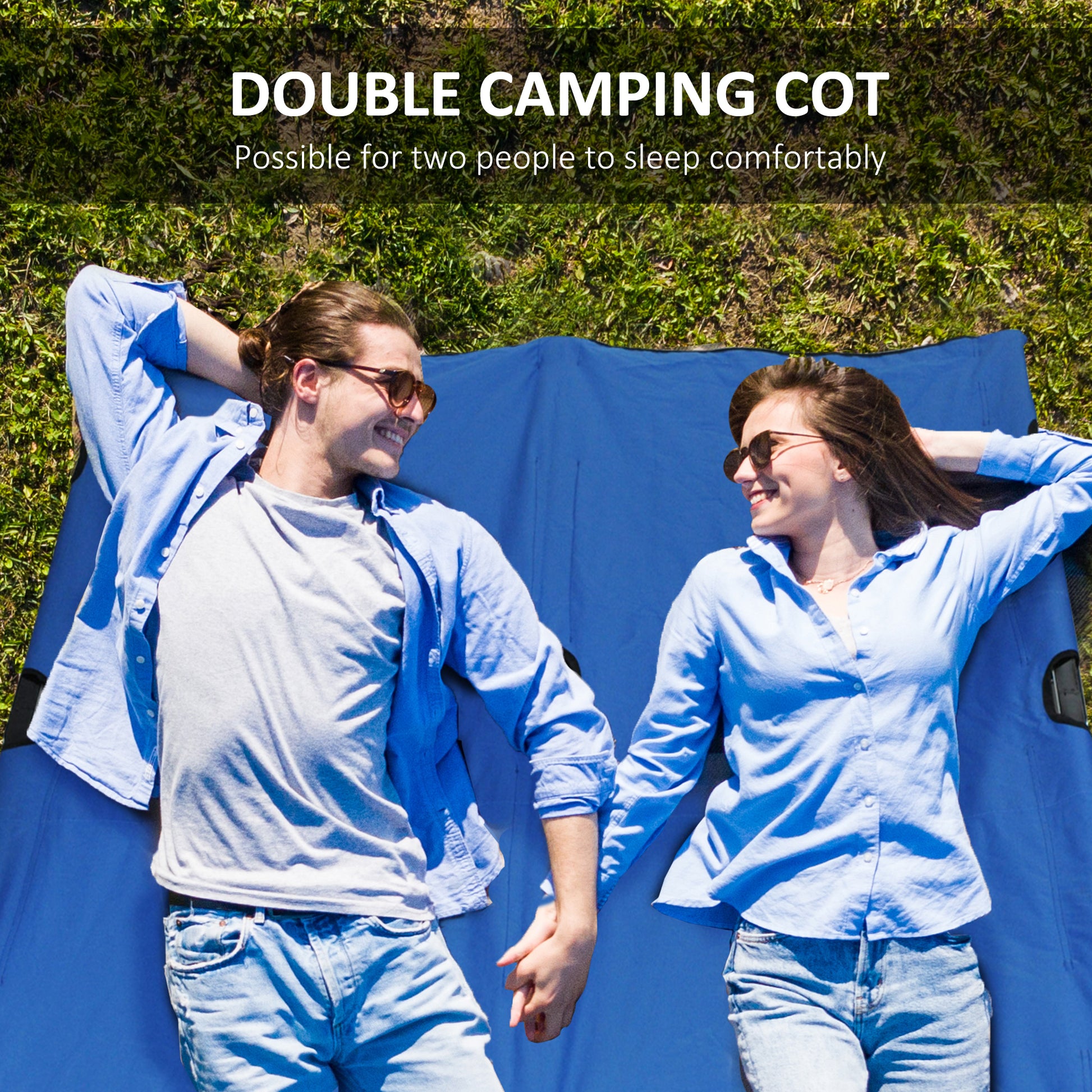 Blue double camping cot with couple relaxing outdoors on grass