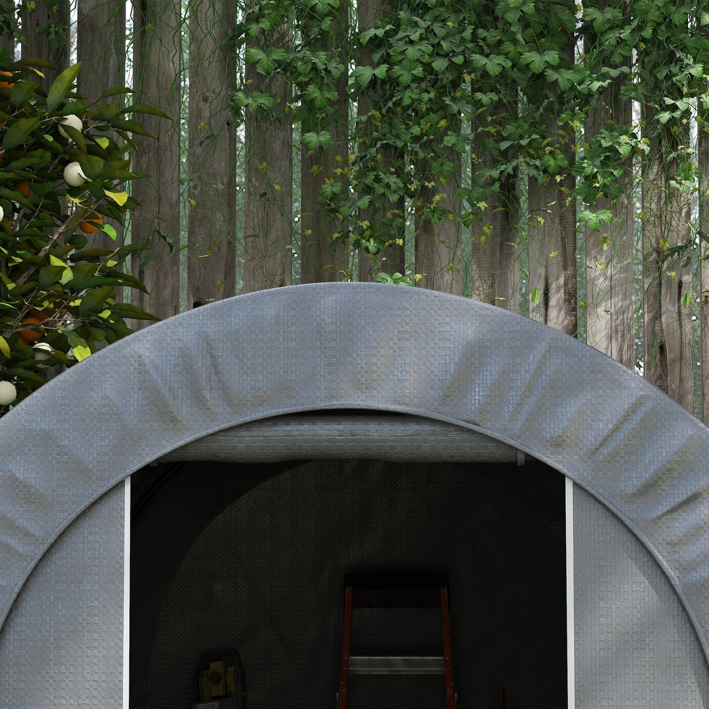 Gray woventexture portable greenhouse with orange tree bearing fruit in background