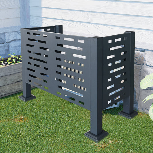 Modern dark gray metal air conditioner screen with geometric cutouts for outdoor unit protection