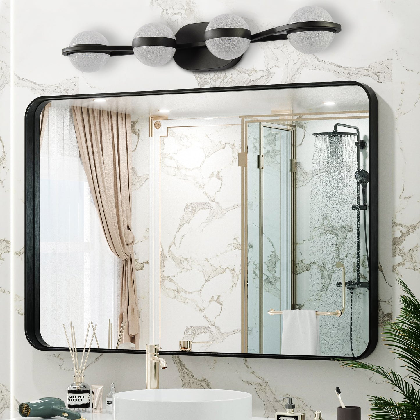 Modern black light vanity light fixture with frosted globe shades and brushed nickel accents