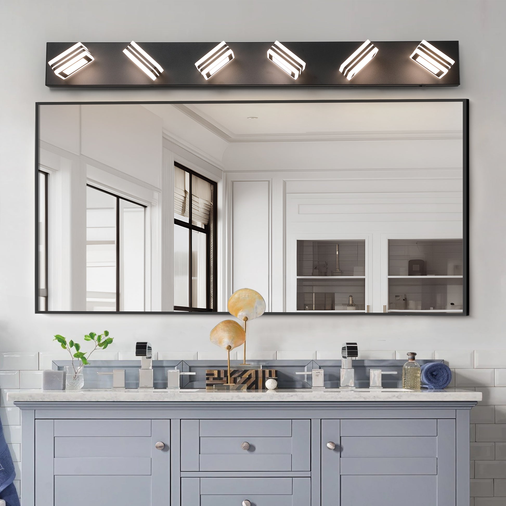 Modern black vanity light fixture with five adjustable LED lights above a large bathroom mirror
