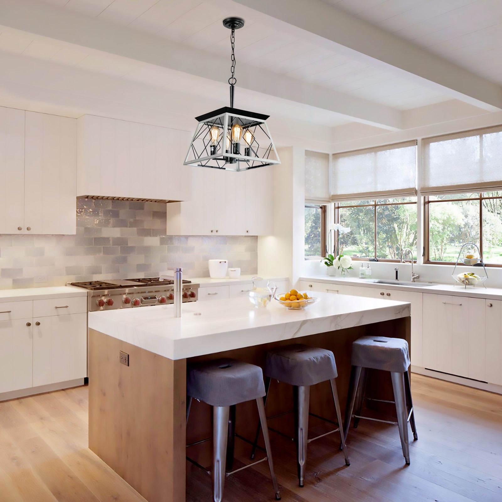 Farmhouse pendant light with geometric black and white metal cage illuminates kitchen island