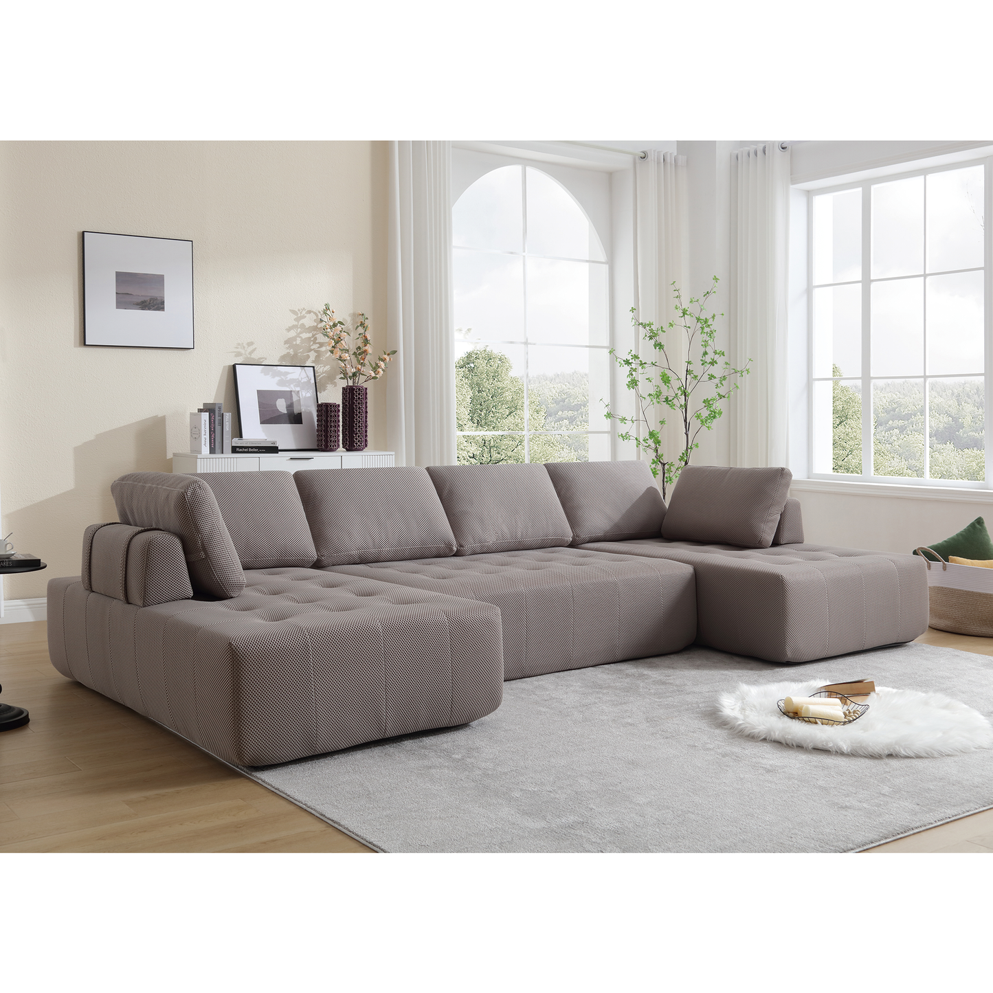 Taupe fabric sectional sofa with tufted cushions and adjustable armrests