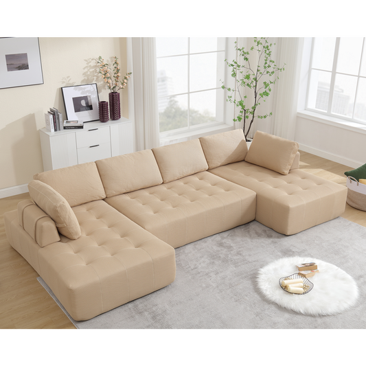 Beige upholstered sectional sofa with tufted cushions and modern design