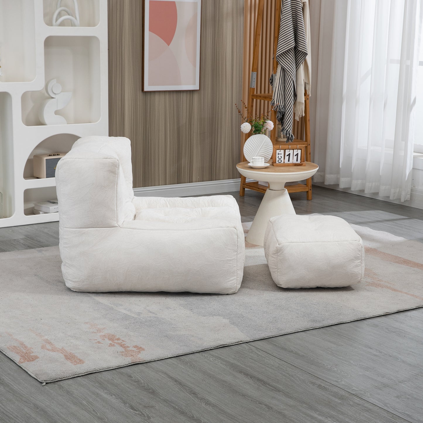 Comfortable offwhite textured bean bag chair with matching ottoman for a cozy living room