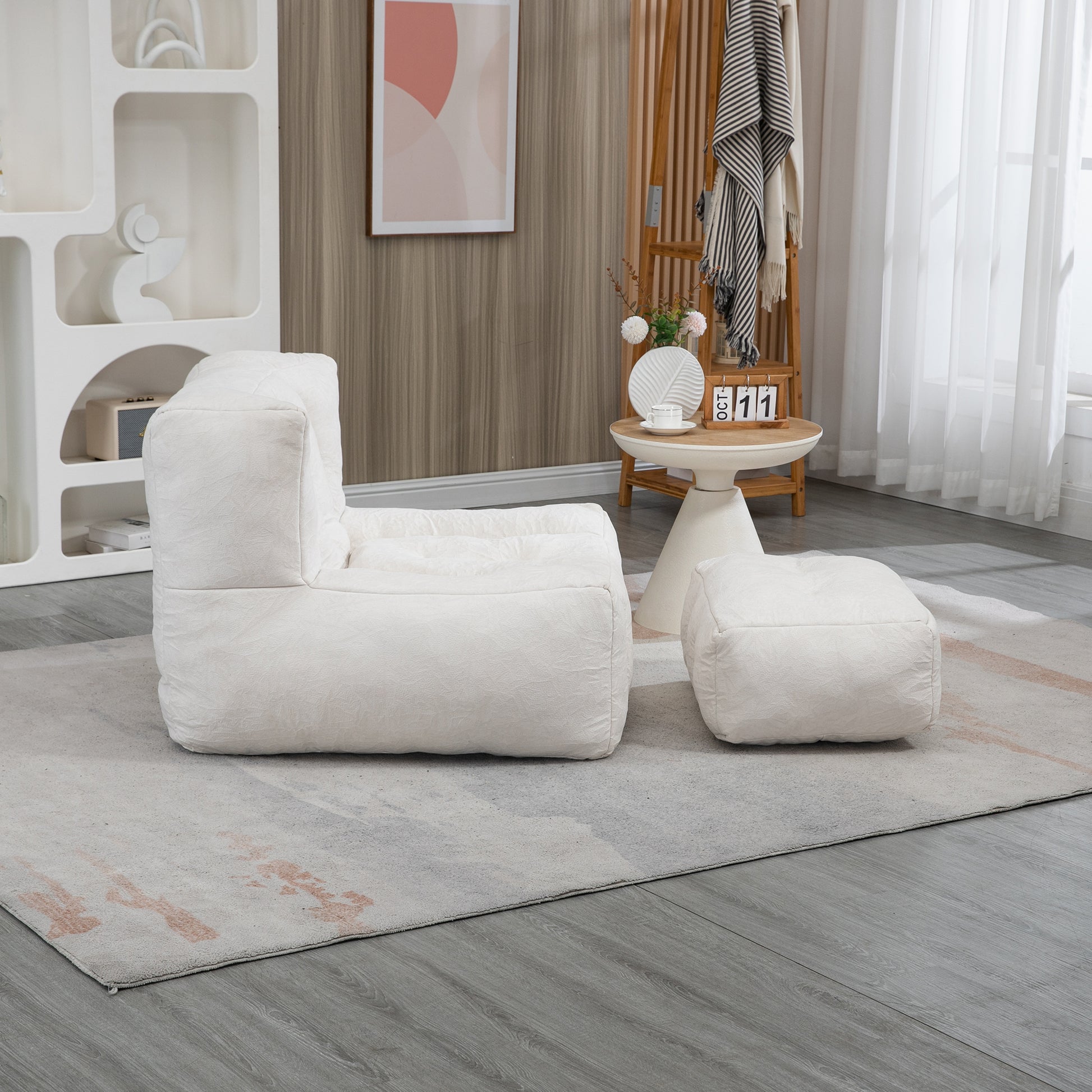 Comfortable offwhite textured bean bag chair with matching ottoman for a cozy living room