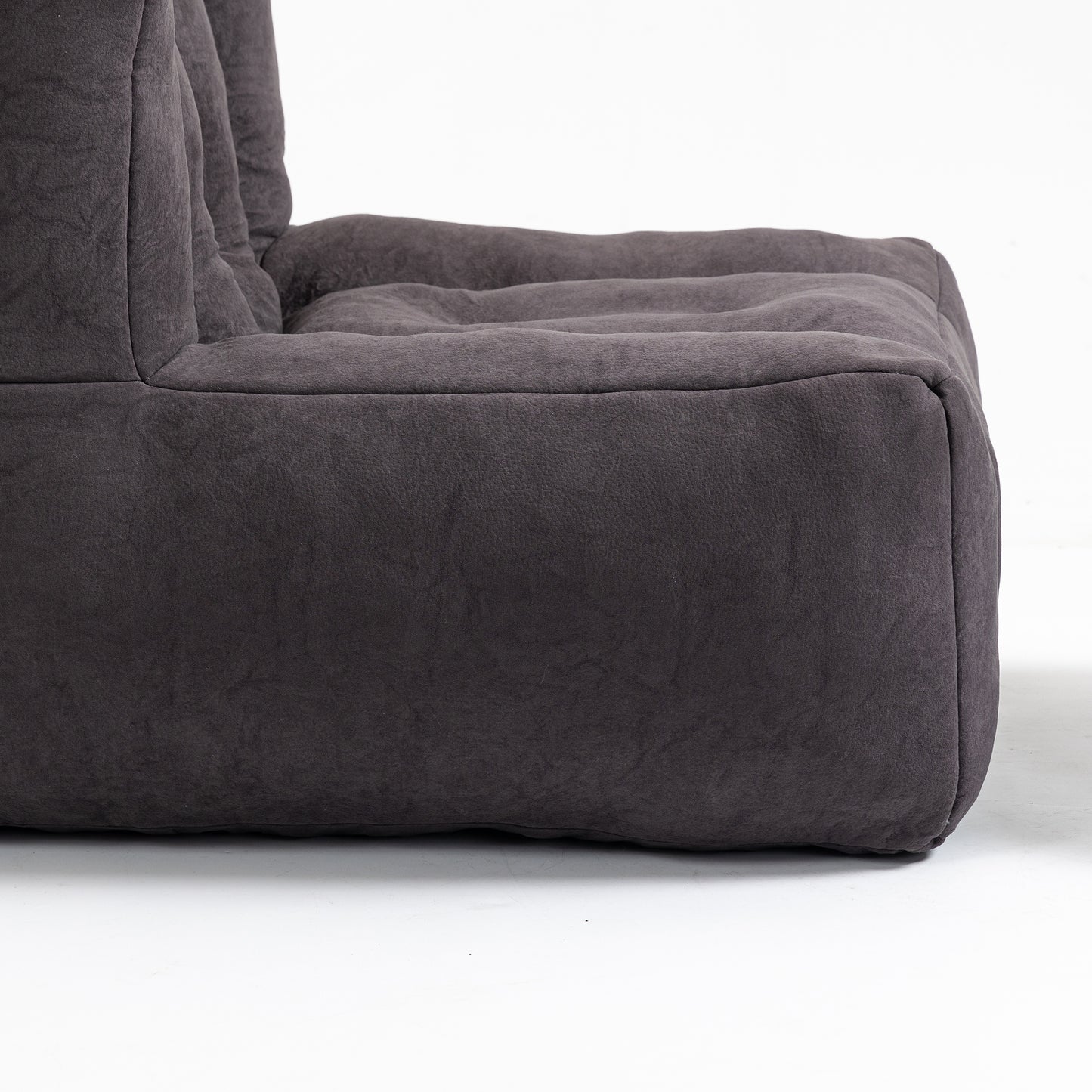Dark gray suede bean bag chair comfortable and casual living room seating