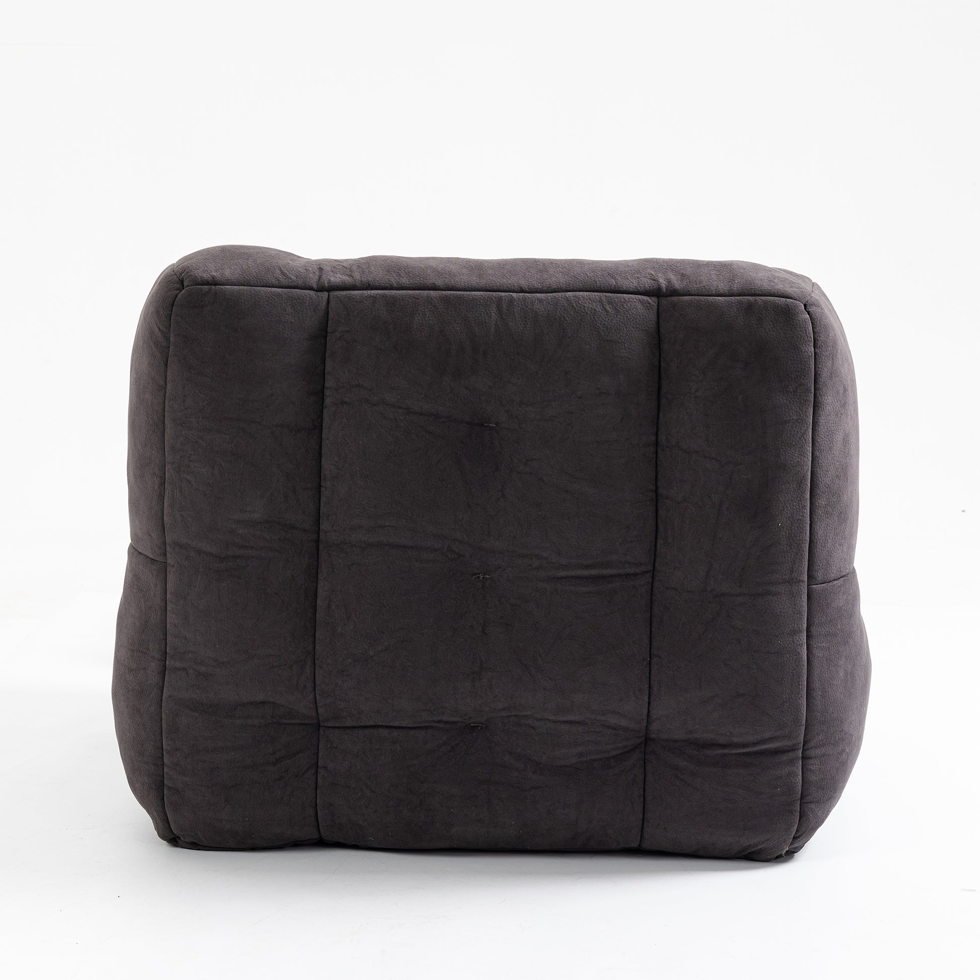 Dark gray tufted upholstered ottoman with textured fabric adds modern comfort to any room