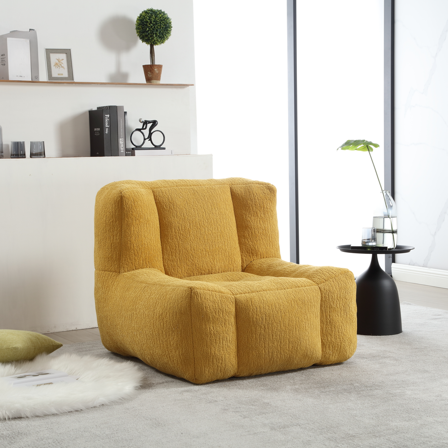 Plush mustard yellow armchair with textured fabric and square seat cushions