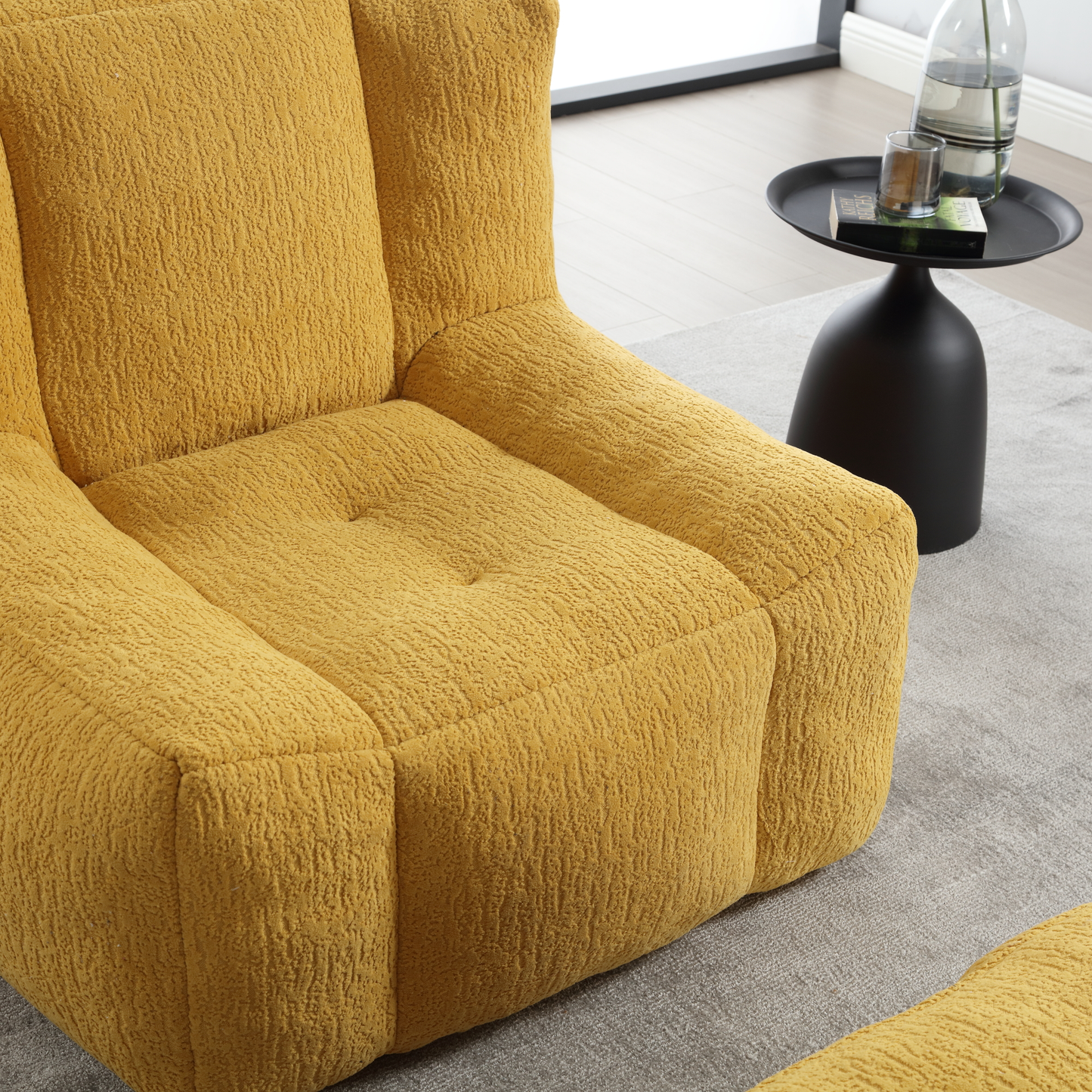 Comfortable mustard yellow boucle armchair with plush cushioning for living room