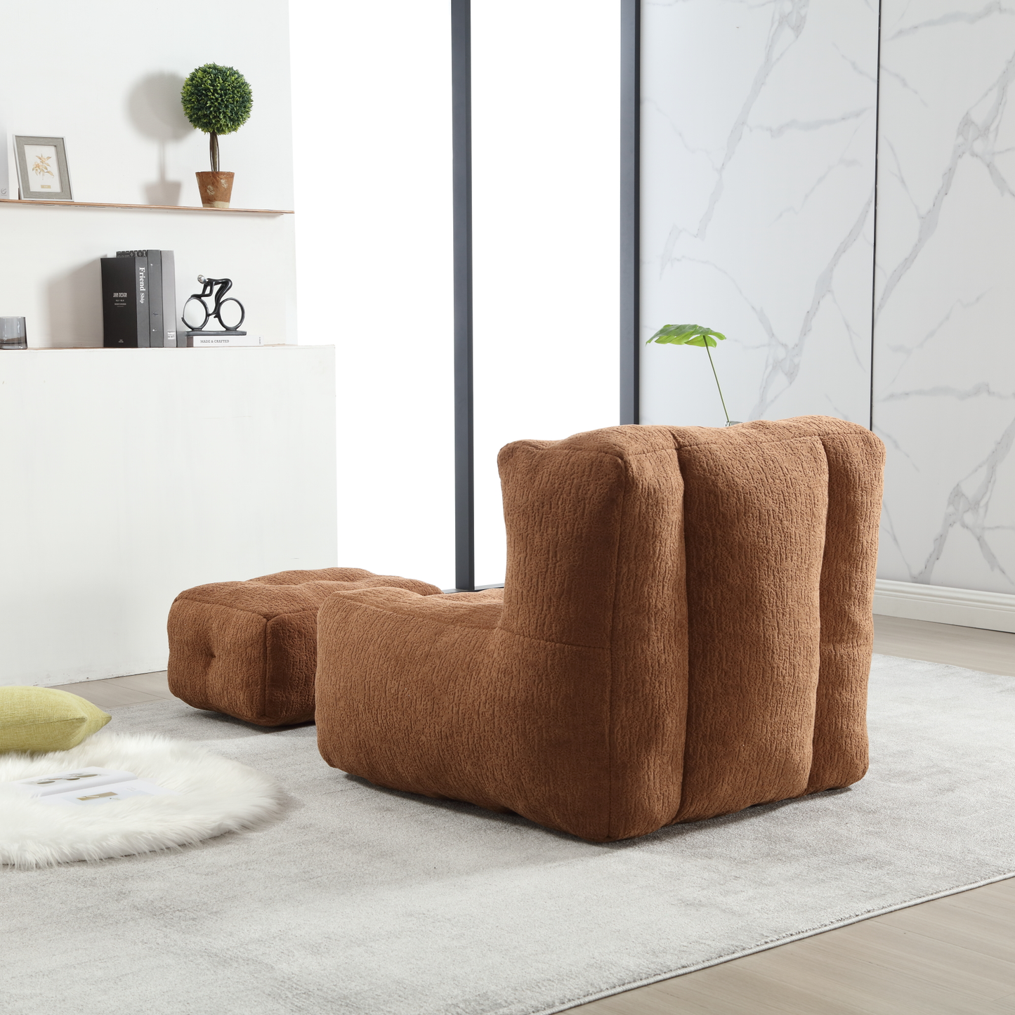 Plush brown modular armchair with a matching ottoman creating a cozy sectional seating arrangement