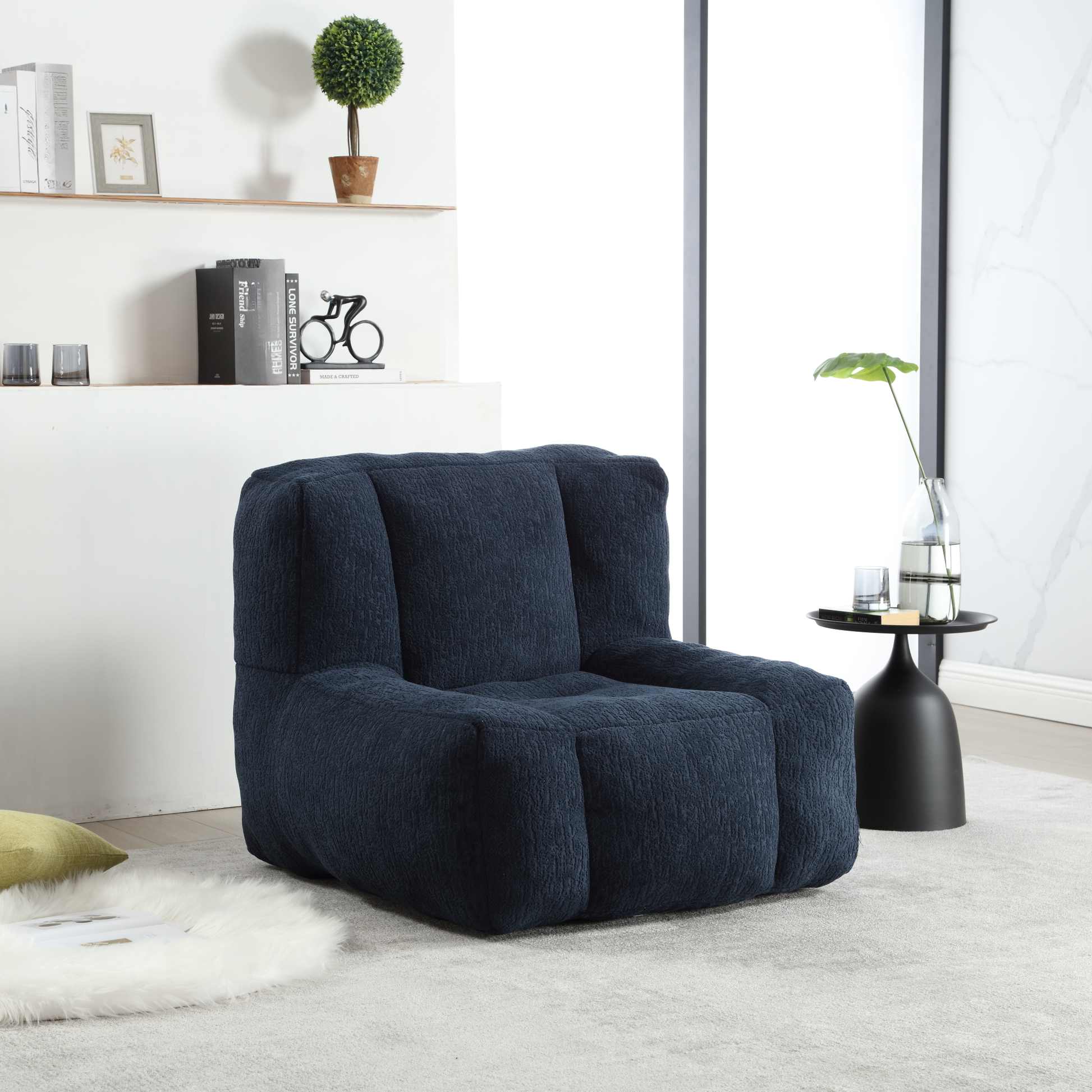 Plush navy blue bean bag armchair with textured fabric perfect for casual living spaces