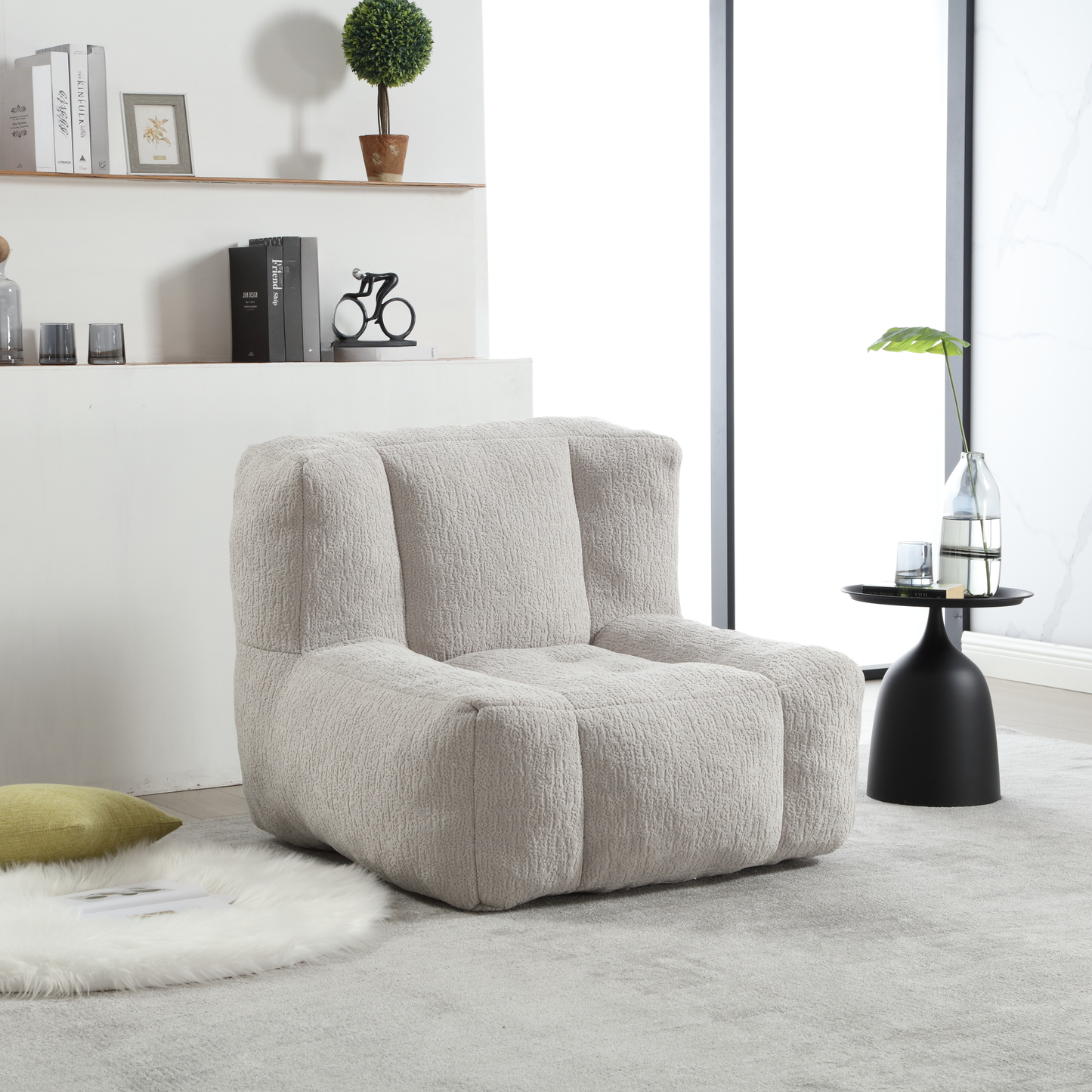 Plush cream armchair with a textured fabric perfect for a modern living room