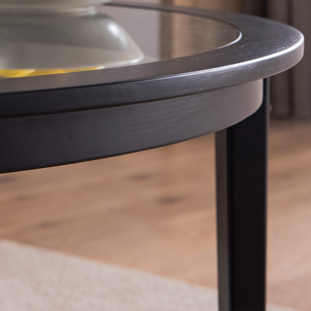 Round black wood coffee table with glass inlay detail modern living room furniture