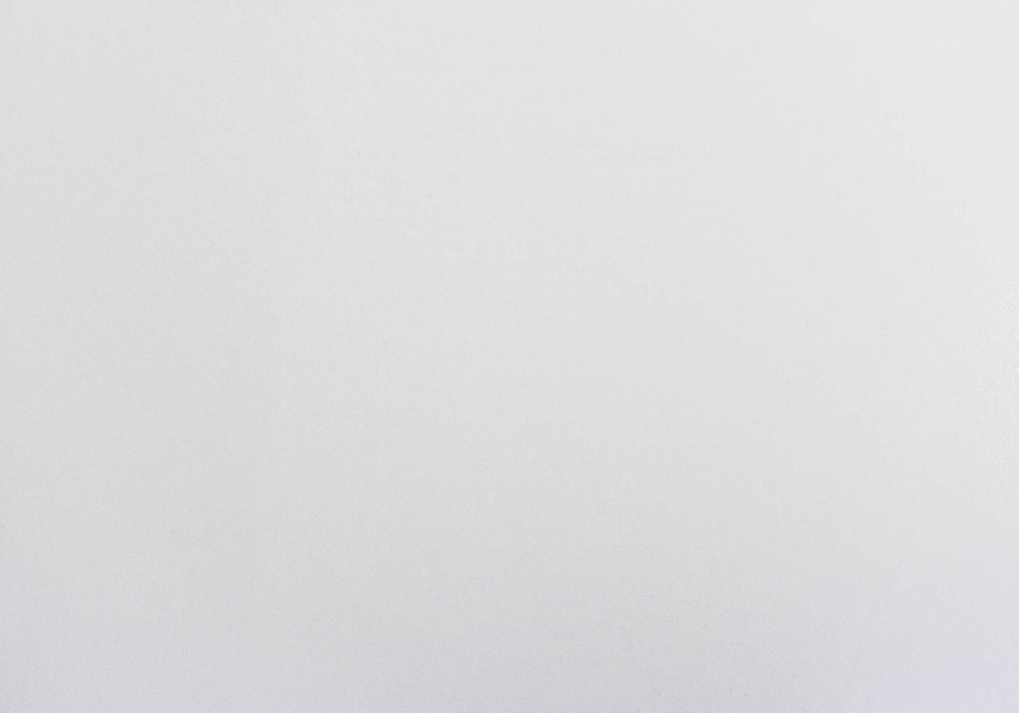 Closeup texture of a smooth white ceramic tile for kitchens