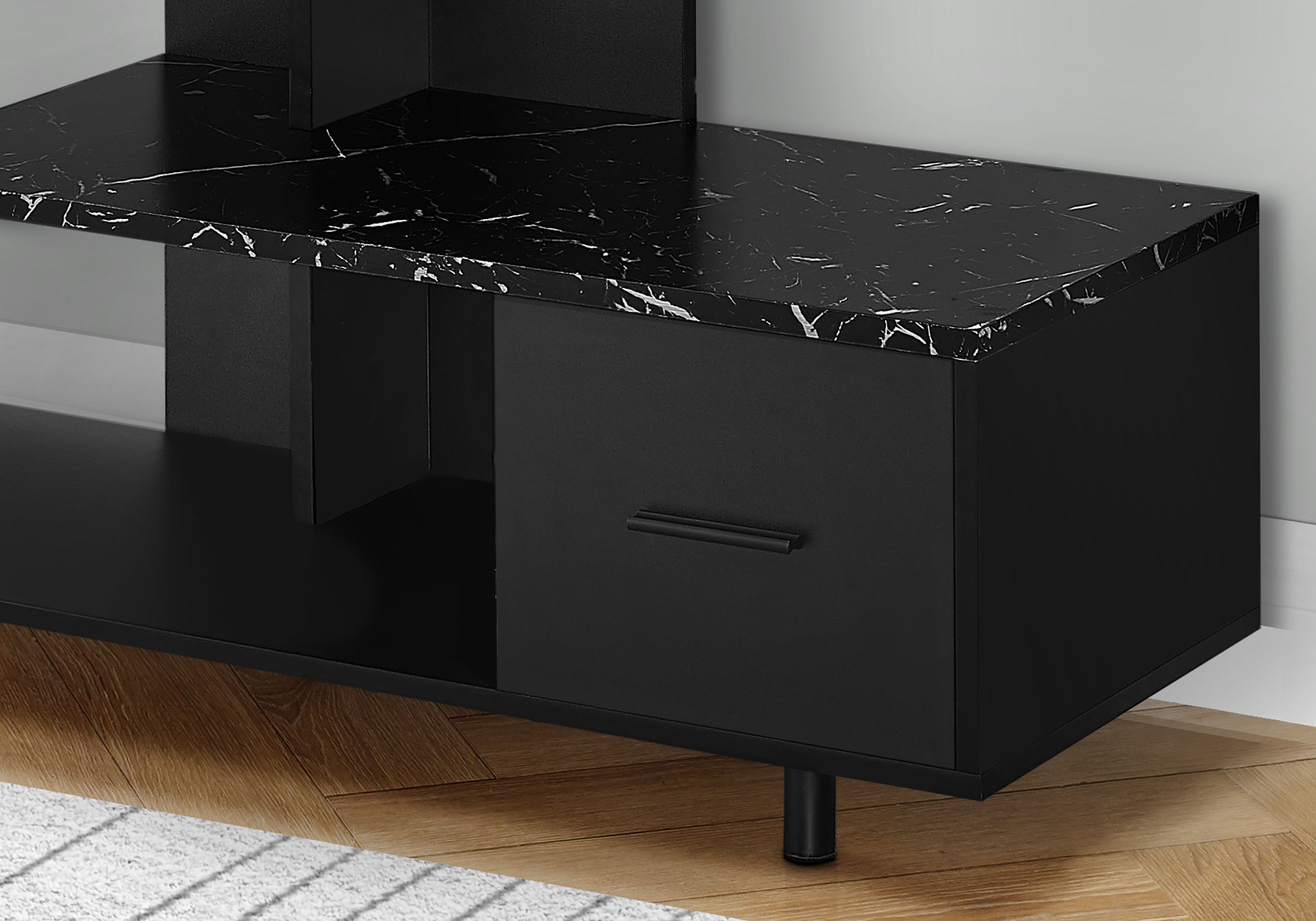 Black faux marble top TV stand with modern minimalist design and black drawer